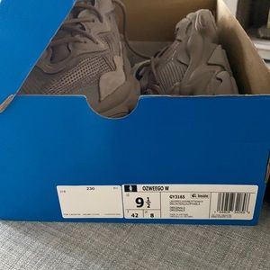 Never worn but I opened the box! Mauve light purple color!! Adidas OZWEEGO